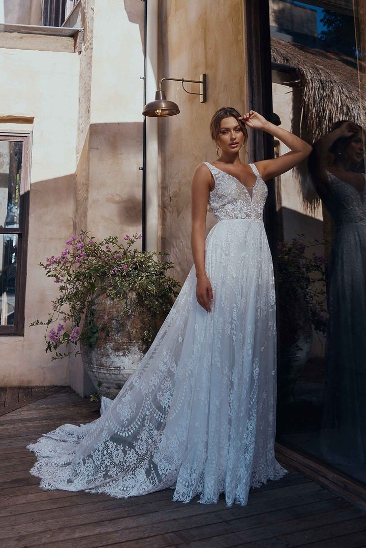 Calypso lace wedding dress from side